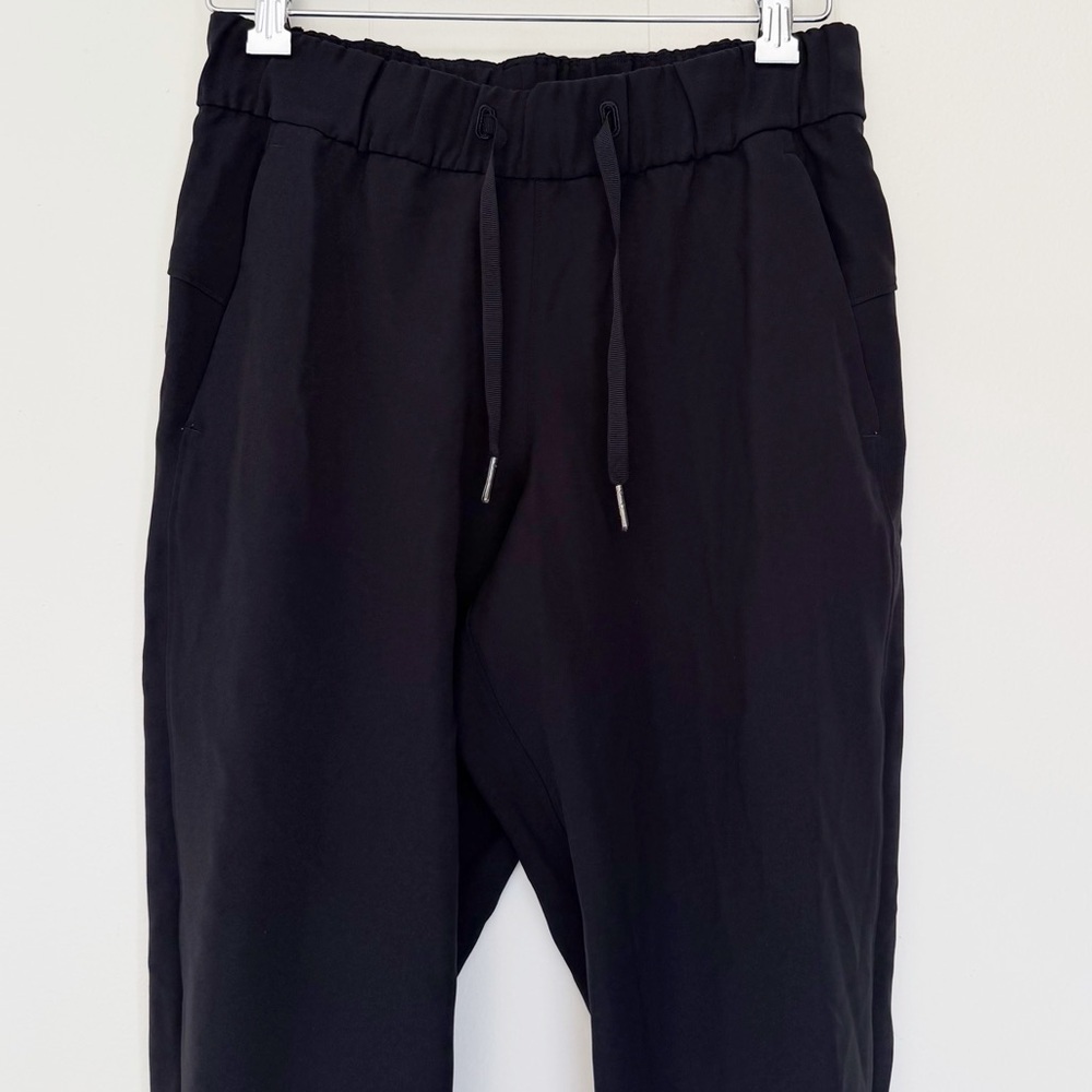 LULULEMON On the Fly 7/8 Pant Woven Black Size 4 LW5BPMS - Picture 2 of 10